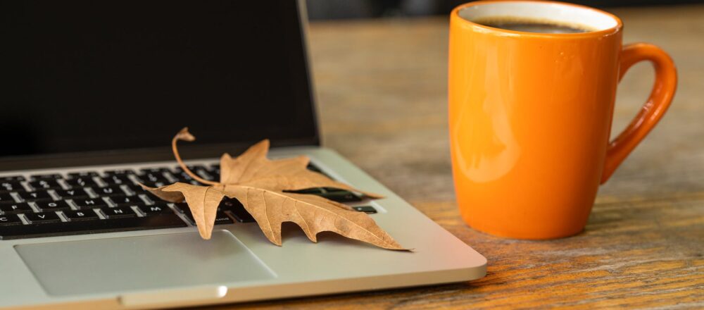 fall leaf on laptop